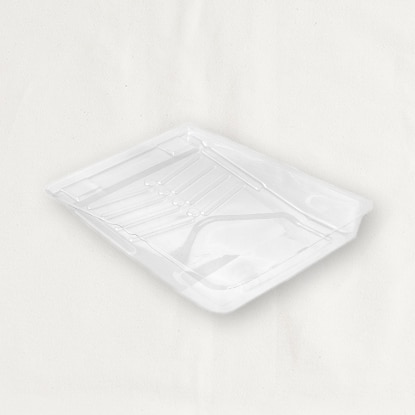 A plastic paint tray liner.