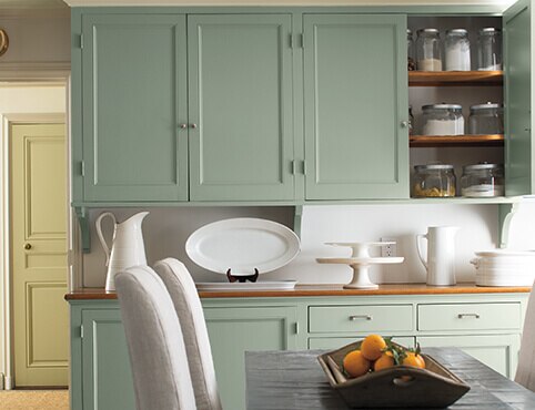 Pale green kitchen cabinets