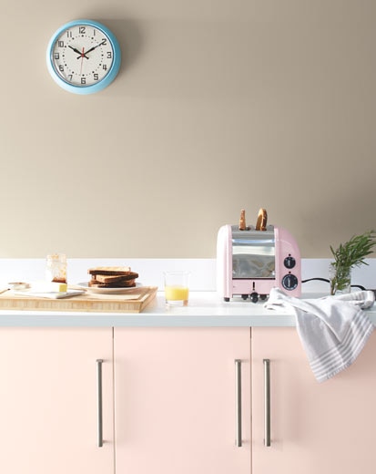 A pale kitchen with pink cabinets painted with Benjamin Moore's 2020 Colour of the Year