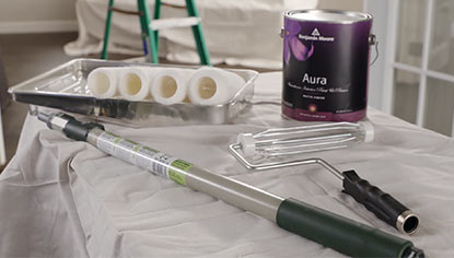 Step 1: Selecting the right tools to paint walls.