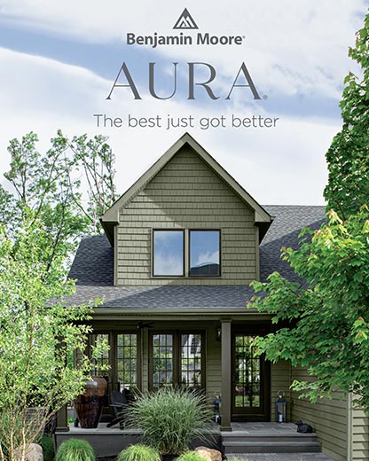 The façade of a green-painted home using AURA® Exterior paint with lush landscaping.